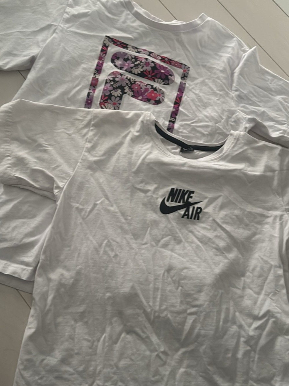 Girls Fila and Unisex Nike white tees hardly worn great material.